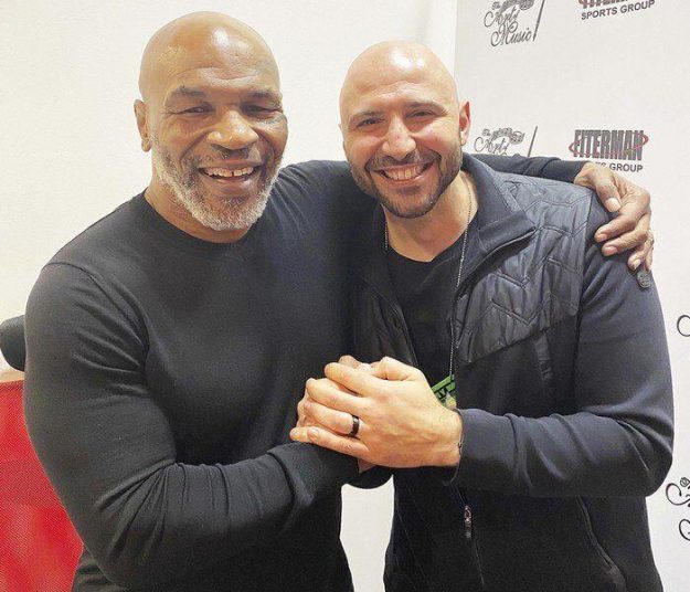 Former boxing world heavyweight champion Mike Tyson, left, is pictured recently with former Lockport gym owner and WKA Cruiserweight Champion of the World Amer Abdallah of Las Vegas.