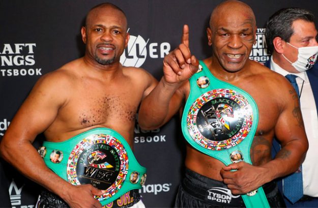 ike Tyson vs Roy Jones Jr ended in a draw. Both men posed after the bout with their belts following their split draw decision. Lace up promotions boxing